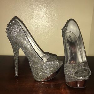 Spikey silver platform heels